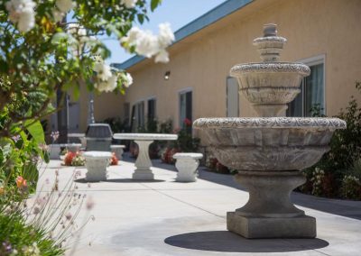 Peaceful fountains and tables in the outdoor seating area